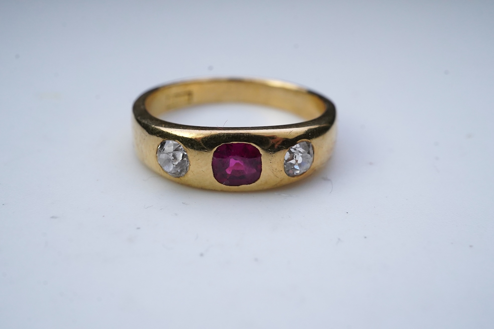 A ruby and diamond three-stone ring, early 20th century